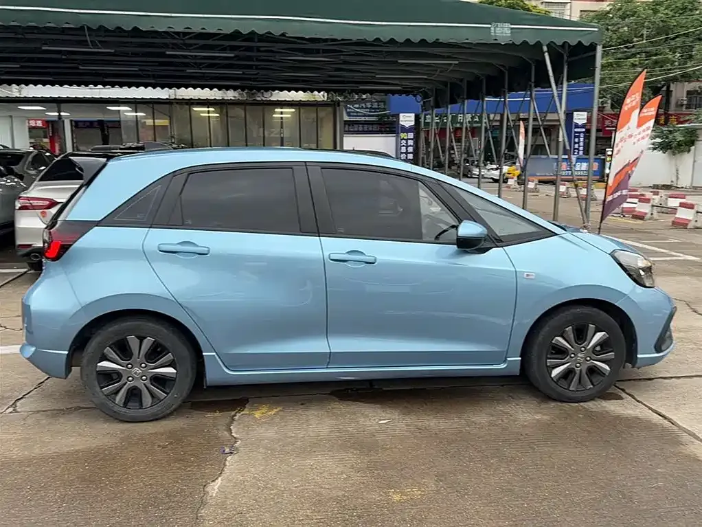 Honda Fit — фото 7