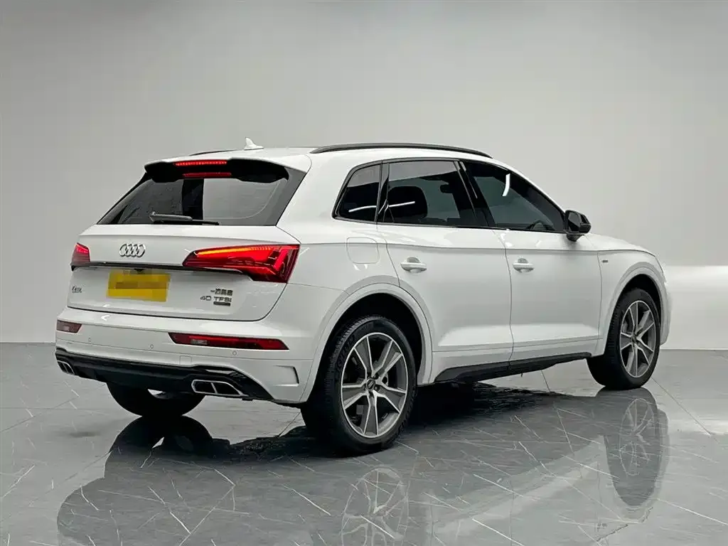 Audi Q5L — фото 6