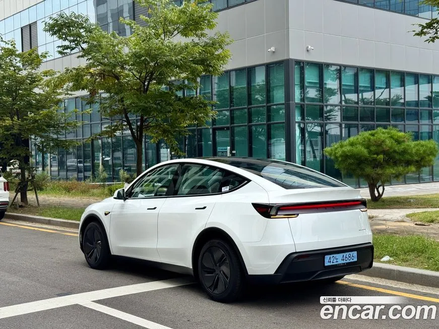 Tesla Model Y — фото 4