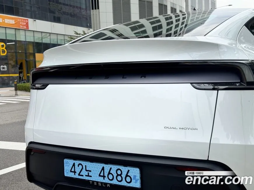 Tesla Model Y — фото 6