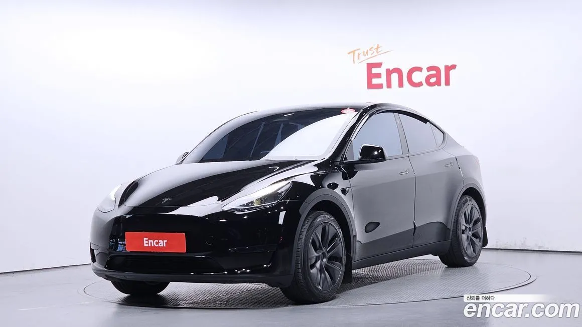 Tesla Model Y — фото 1