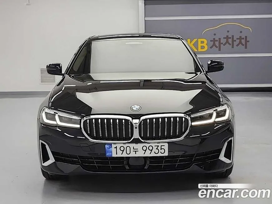 BMW 5-Series — фото 1
