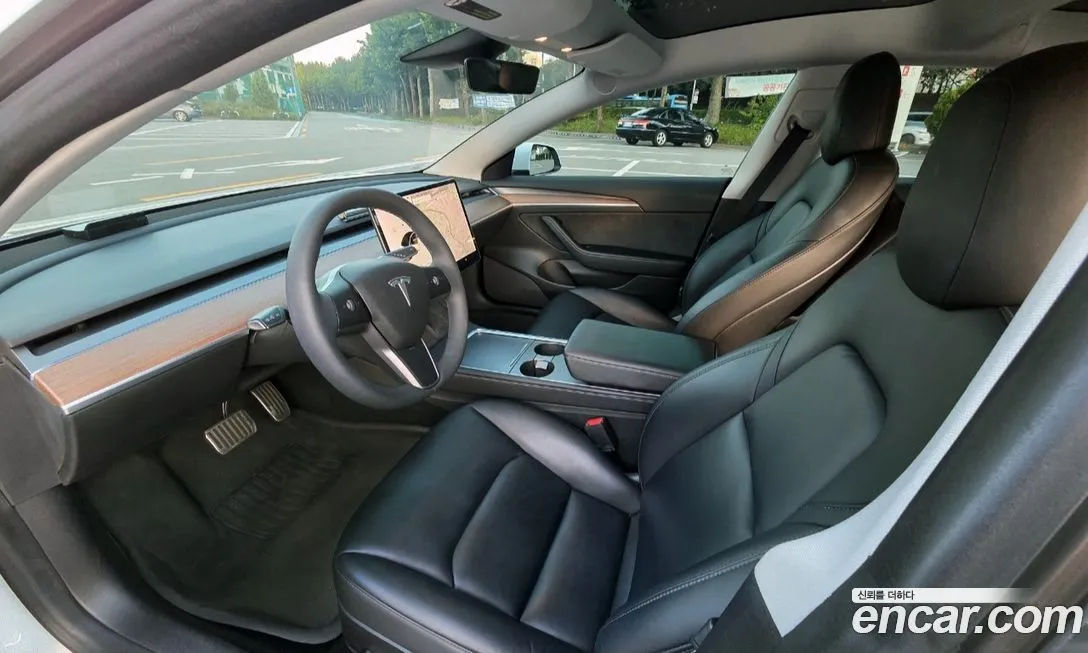 Tesla Model 3 — фото 10