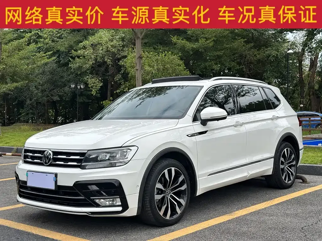 Volkswagen Tiguan L — фото 1