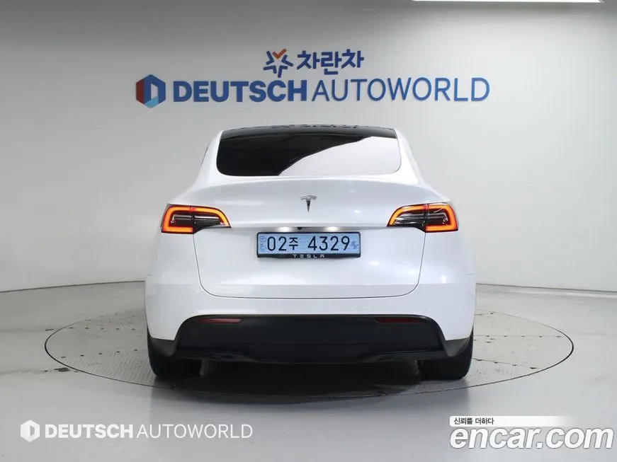 Tesla Model Y — фото 4
