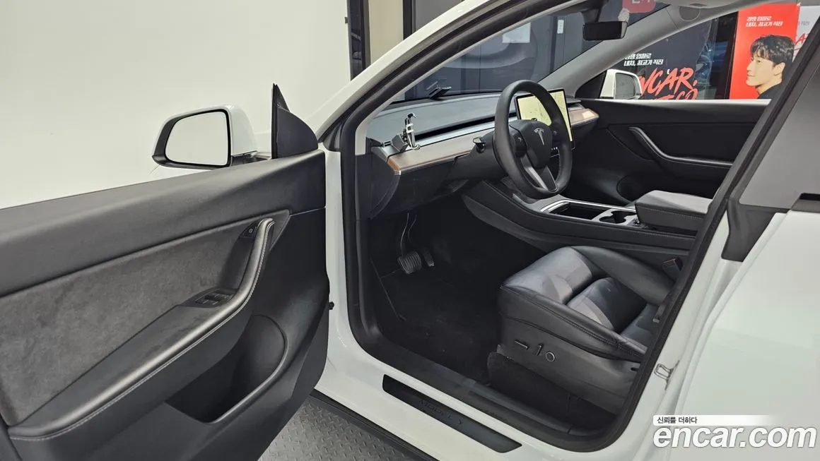 Tesla Model Y — фото 10