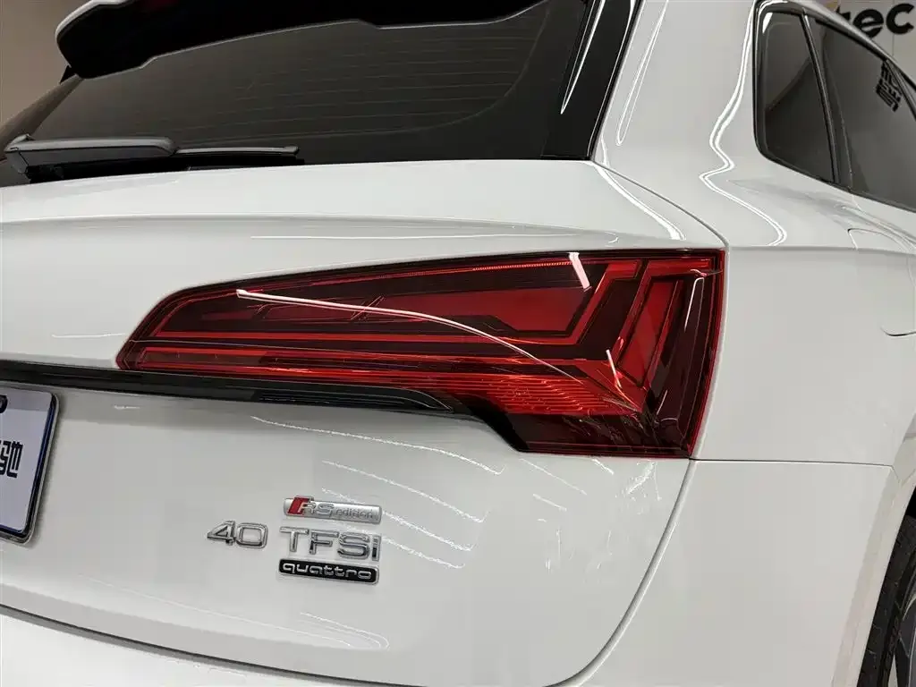 Audi Q5L — фото 10