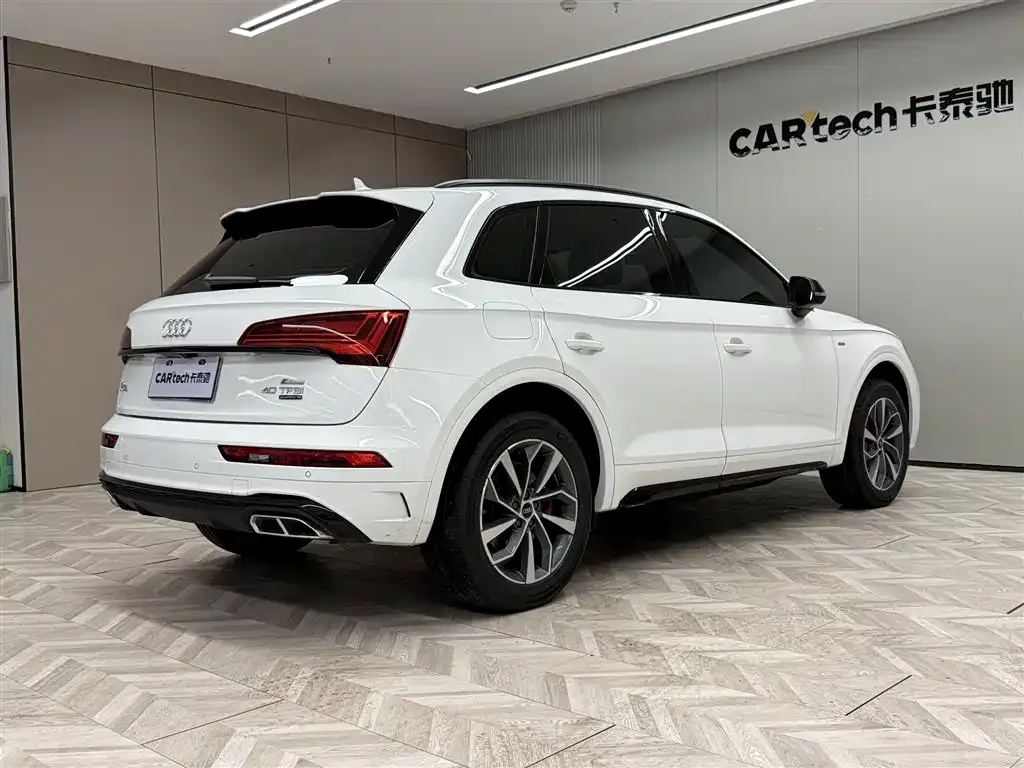 Audi Q5L — фото 5