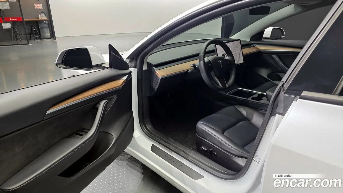Tesla Model 3 — фото 10