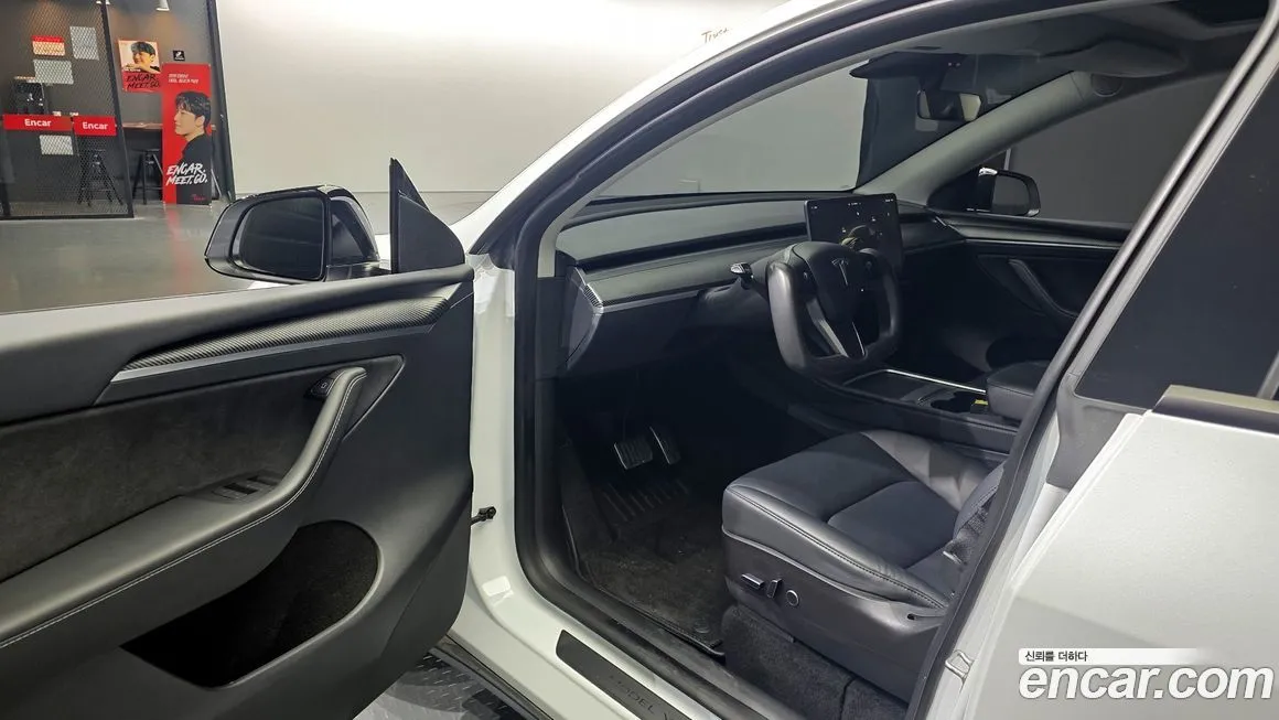 Tesla Model Y — фото 10