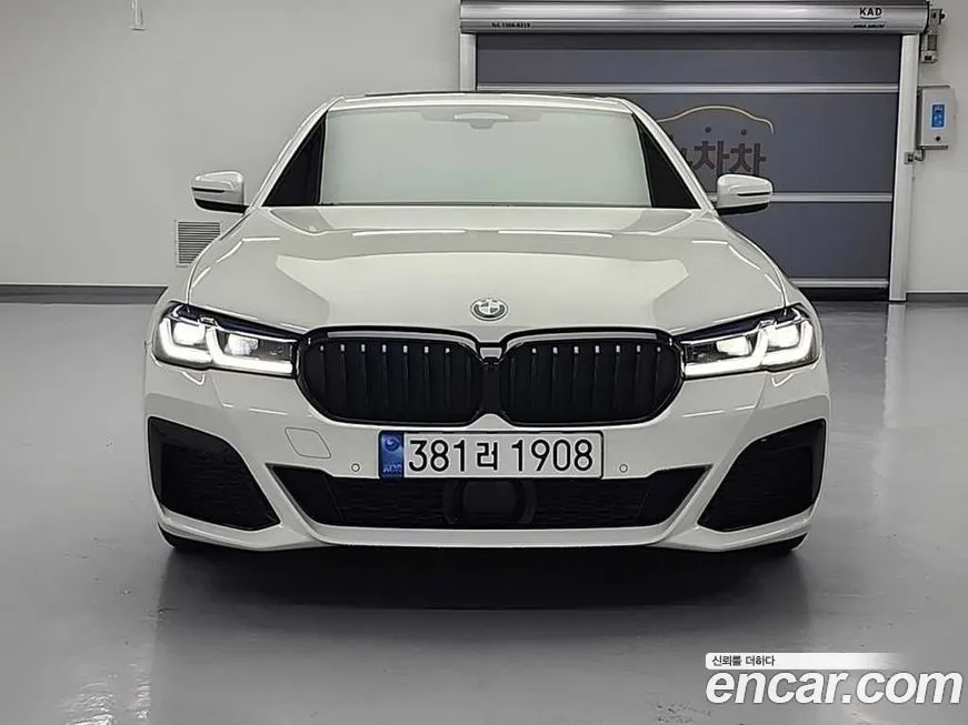 BMW 5-Series — фото 1
