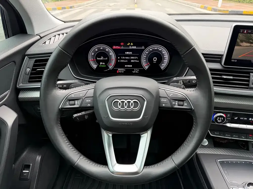 Audi Q5L — фото 10