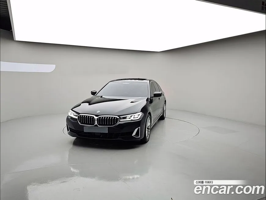 BMW 5-Series — фото 1