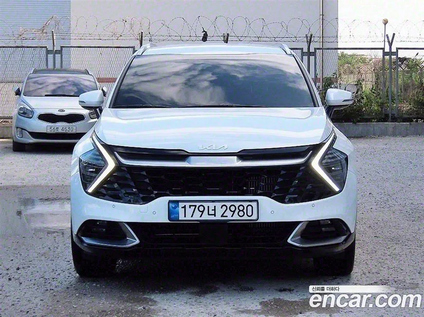 Kia Sportage — фото 1