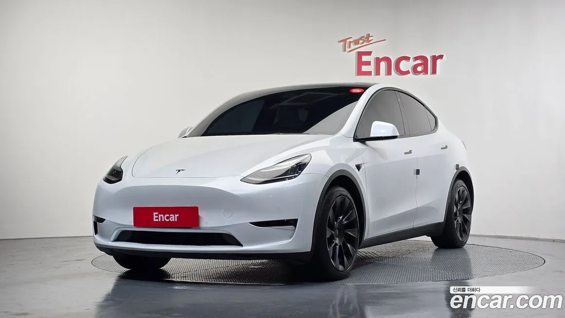 Tesla Model Y — фото 1