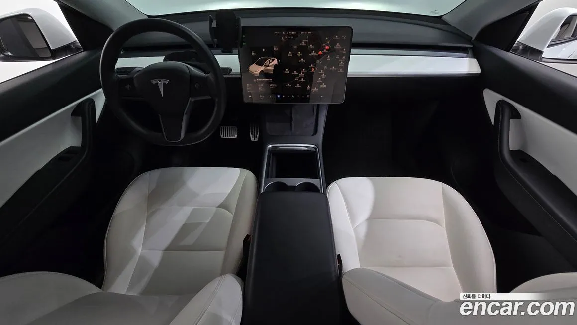 Tesla Model Y — фото 7