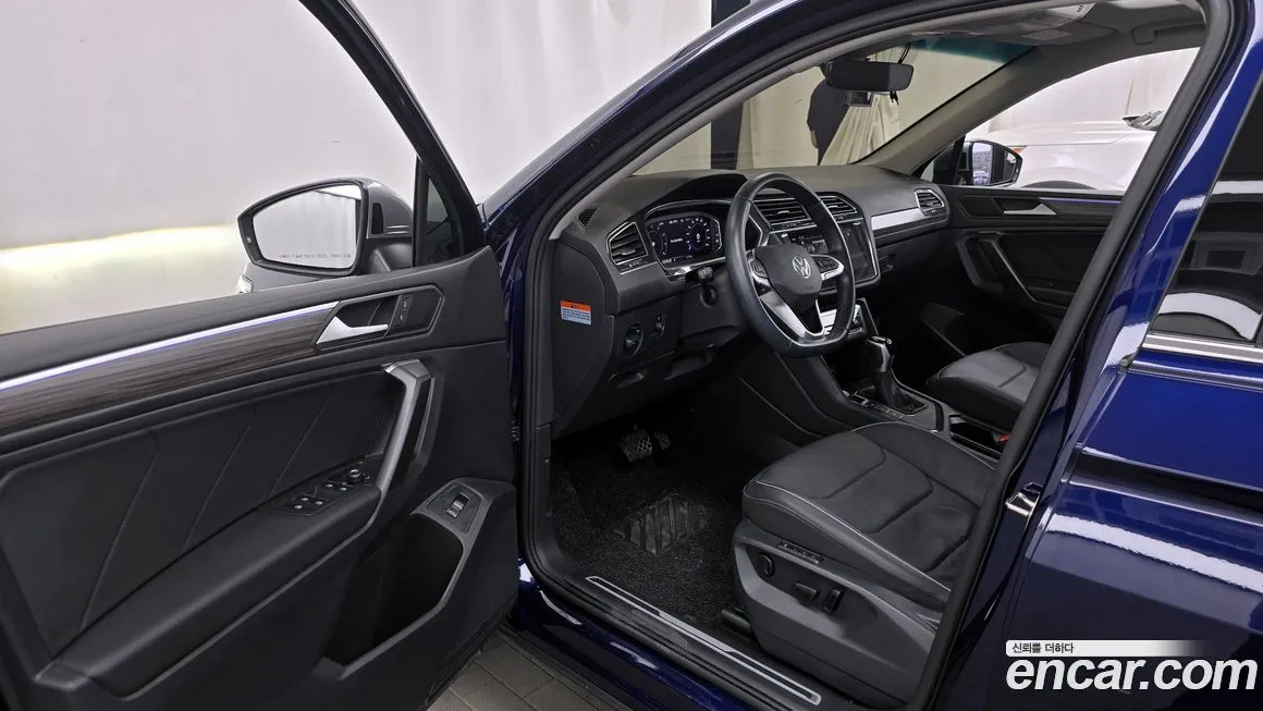 Volkswagen Tiguan — фото 10