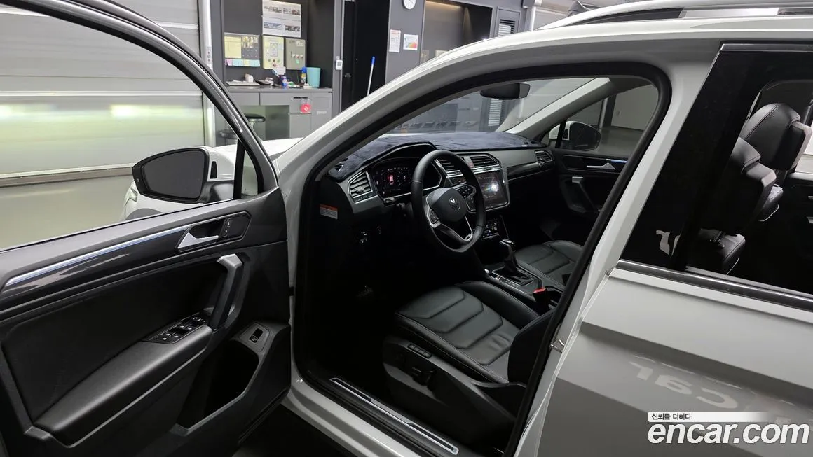 Volkswagen Tiguan — фото 10