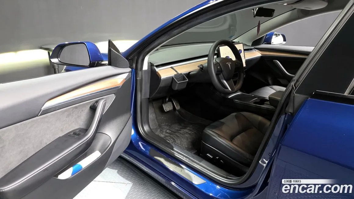 Tesla Model 3 — фото 10