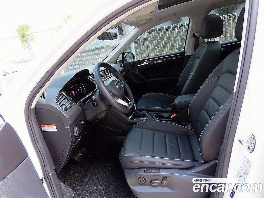 Volkswagen Tiguan — фото 5