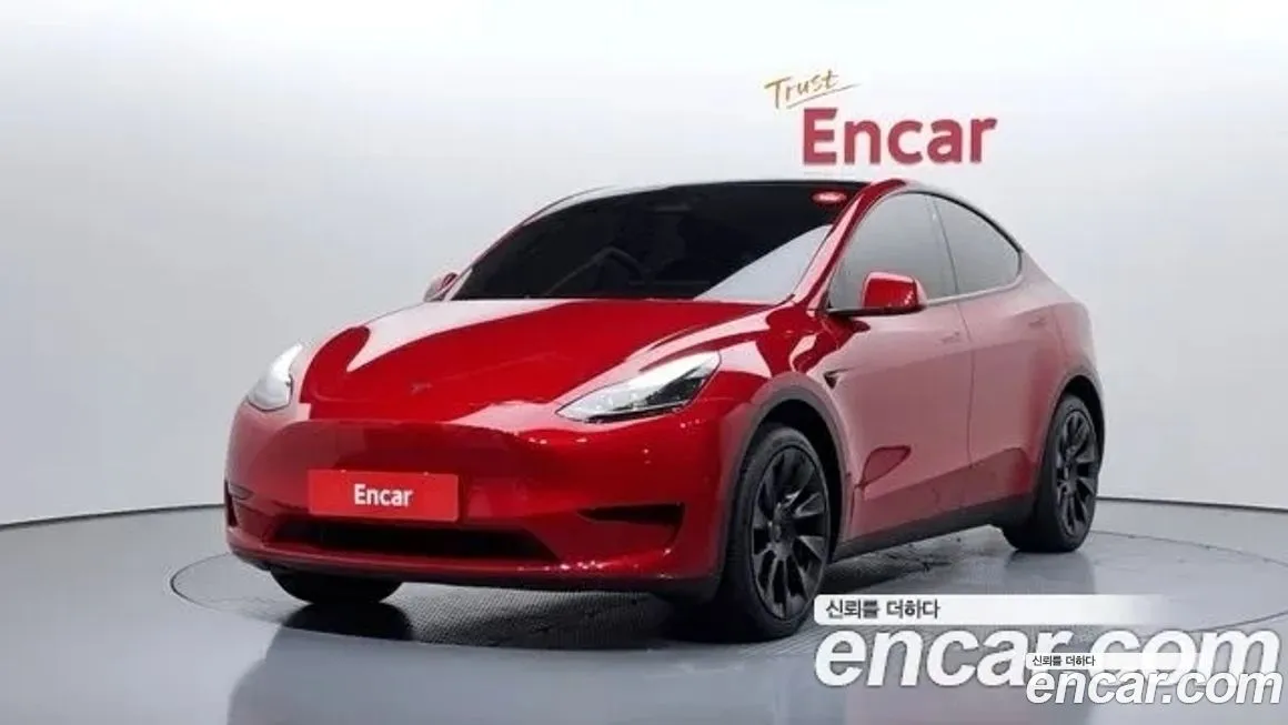 Tesla Model Y — фото 1