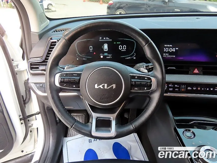 Kia Sportage — фото 10
