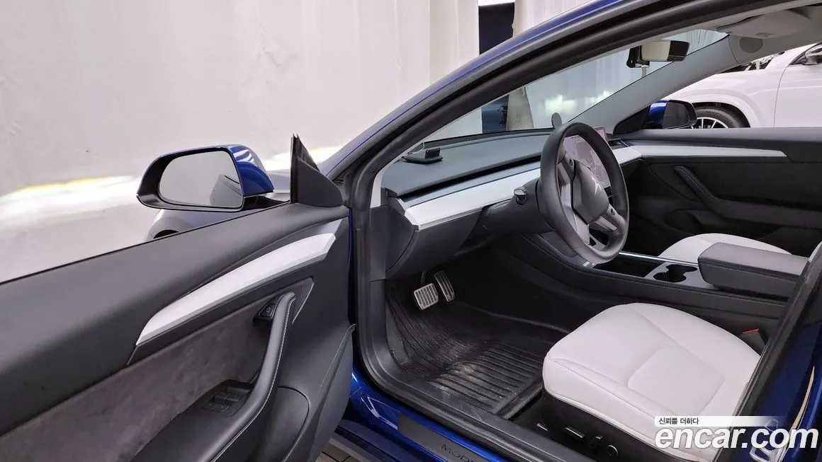 Tesla Model 3 — фото 10