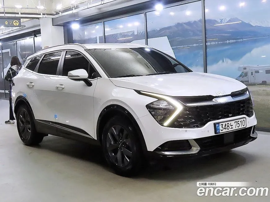 Kia Sportage — фото 1