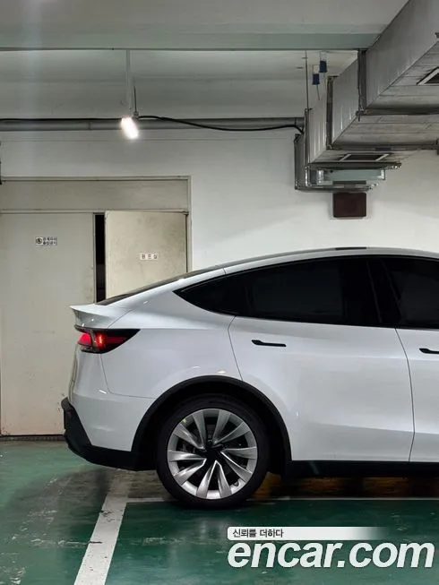Tesla Model Y — фото 6