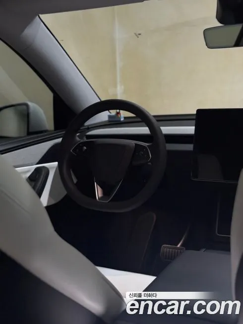 Tesla Model Y — фото 9