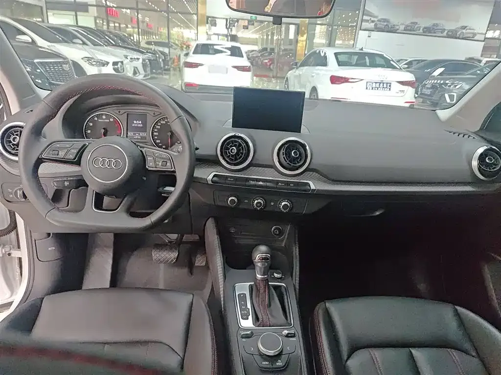 Audi Q2L 2023 из CN, фото 10