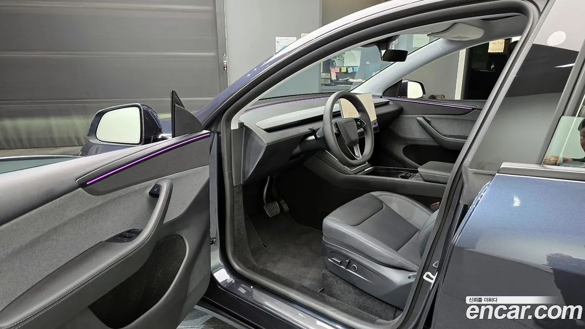 Tesla Model Y — фото 10