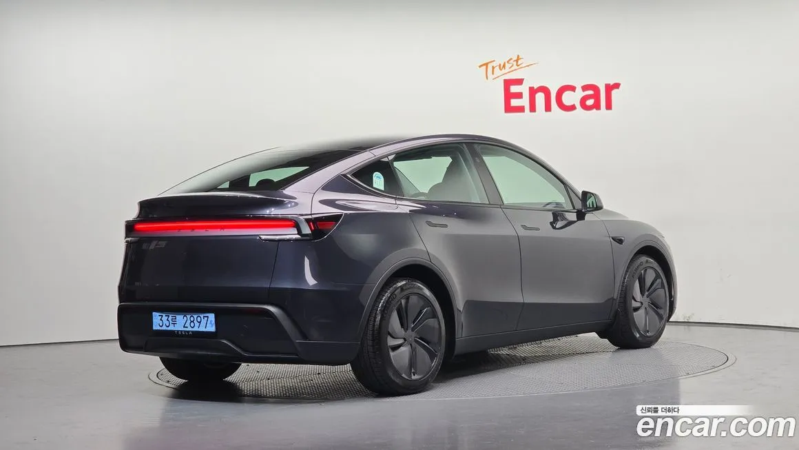 Tesla Model Y — фото 2