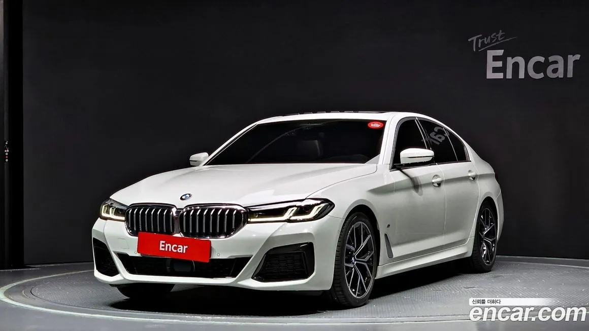 BMW 5-Series — фото 1