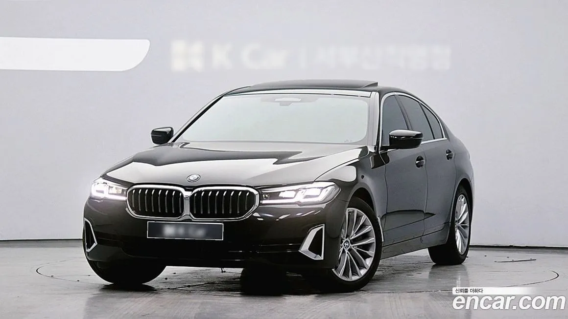 BMW 5-Series — фото 1