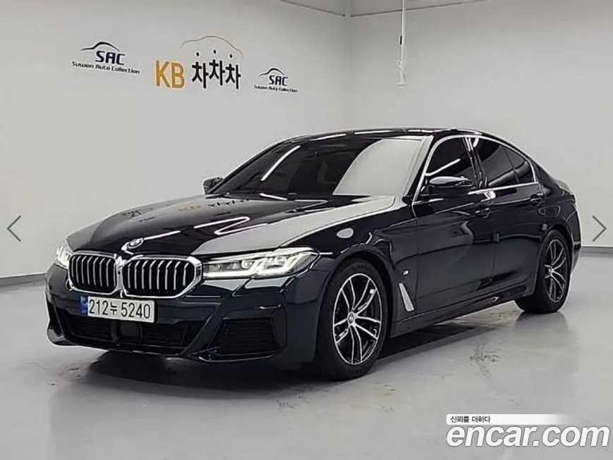 BMW 5-Series — фото 1