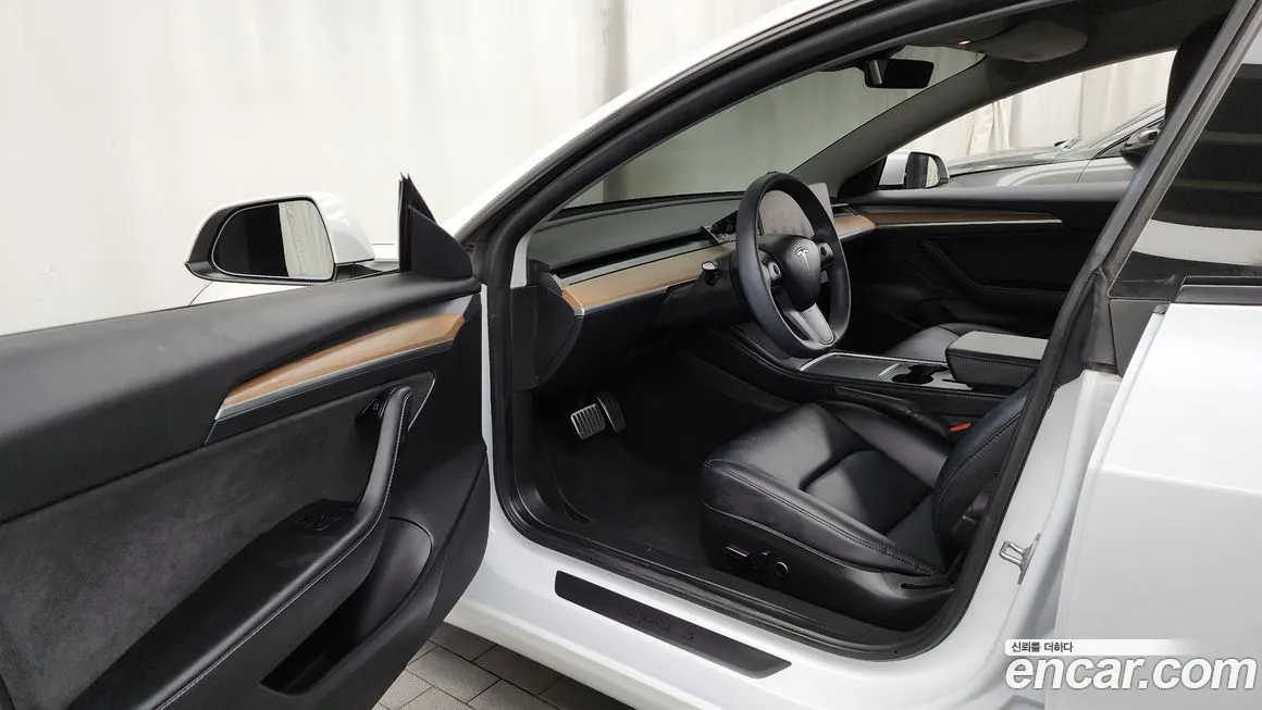 Tesla Model 3 — фото 10