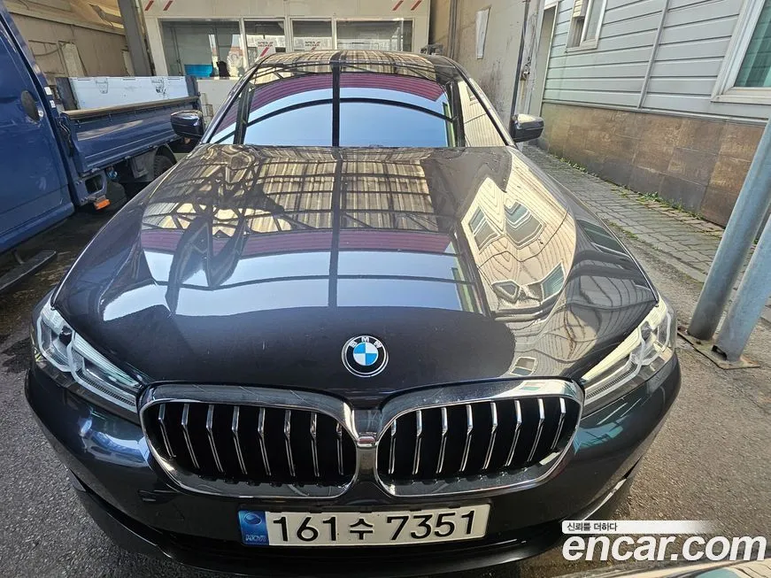 BMW 5-Series — фото 1