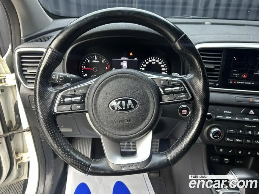 Kia Sportage — фото 10