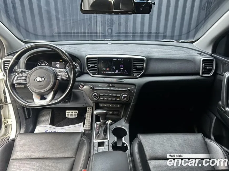 Kia Sportage — фото 9