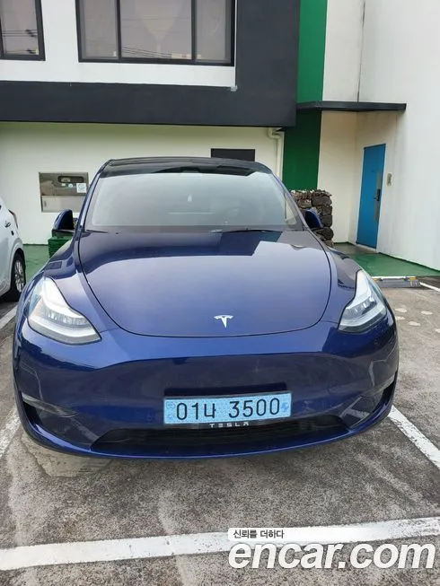 Tesla Model Y — фото 1