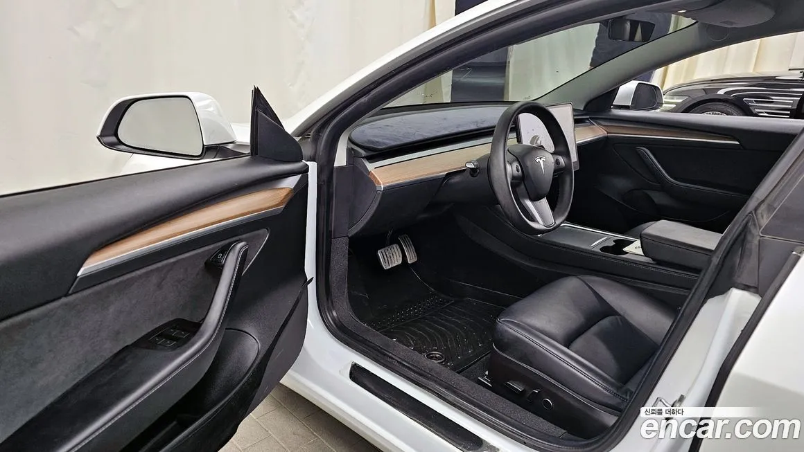 Tesla Model 3 — фото 10