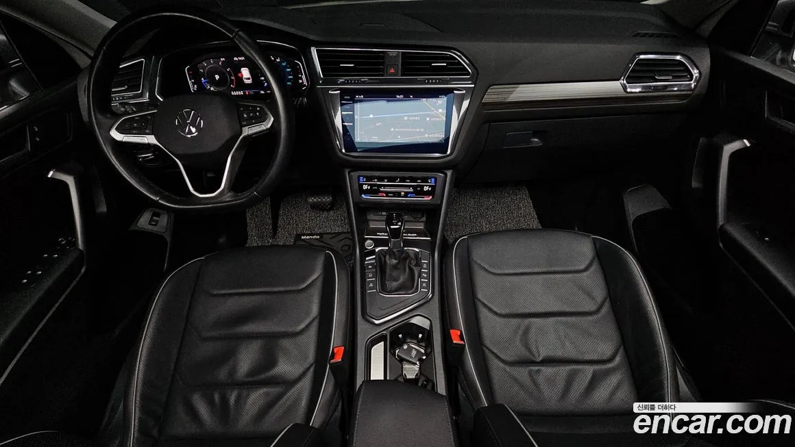 Volkswagen Tiguan — фото 7