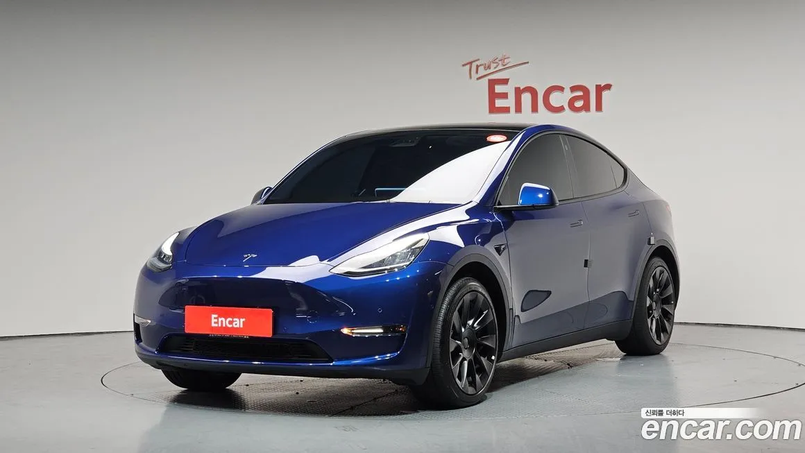 Tesla Model Y — фото 1