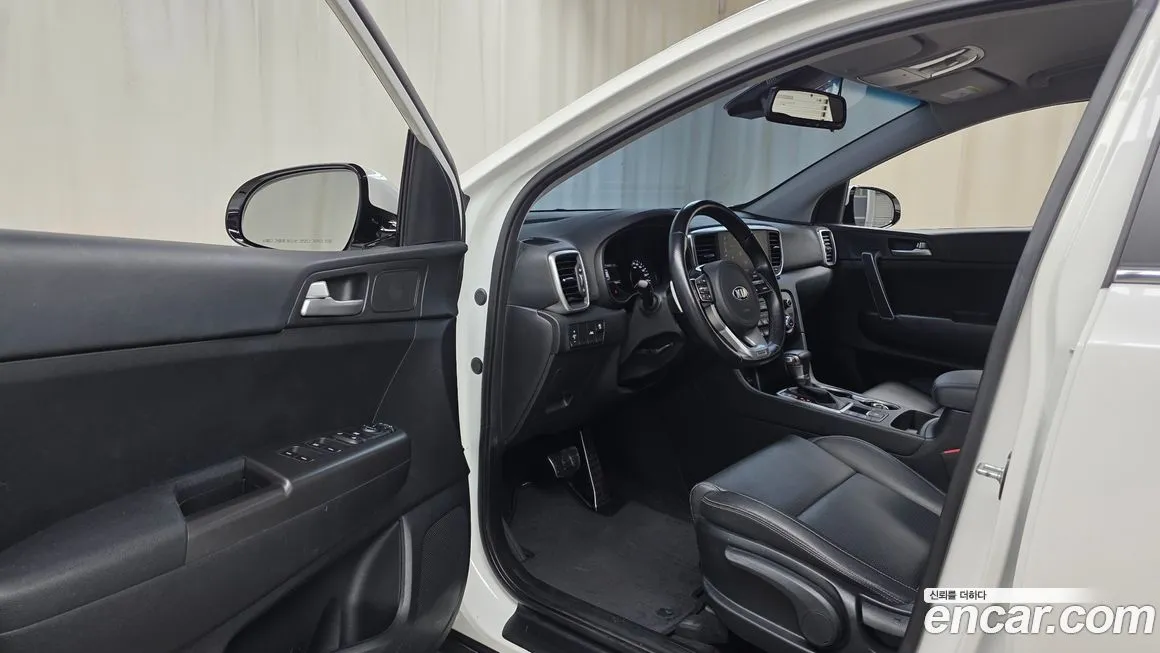 Kia Sportage — фото 10
