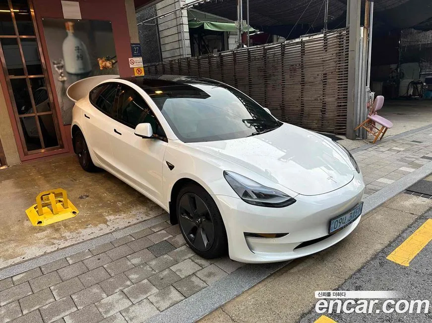 Tesla Model 3 — фото 1