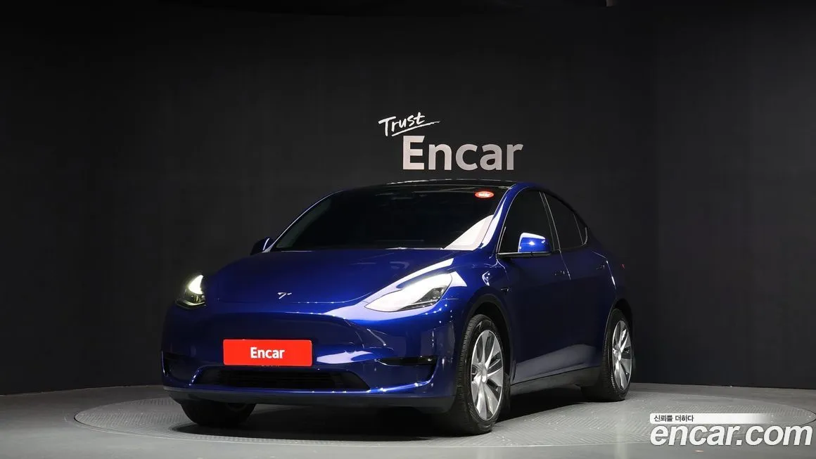 Tesla Model Y — фото 1
