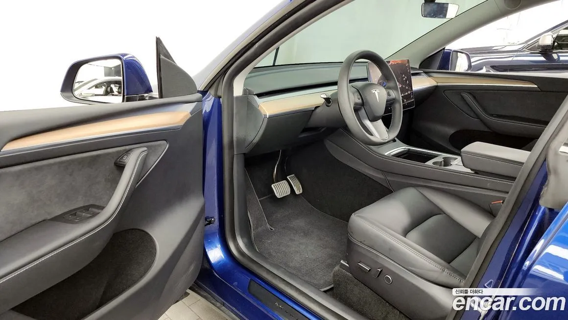 Tesla Model Y — фото 10