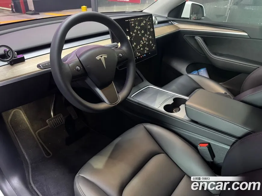 Tesla Model Y — фото 6