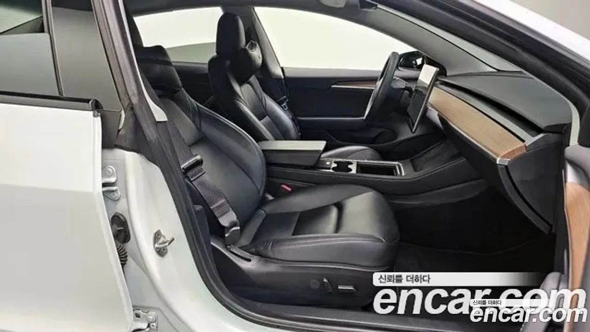 Tesla Model 3 — фото 10